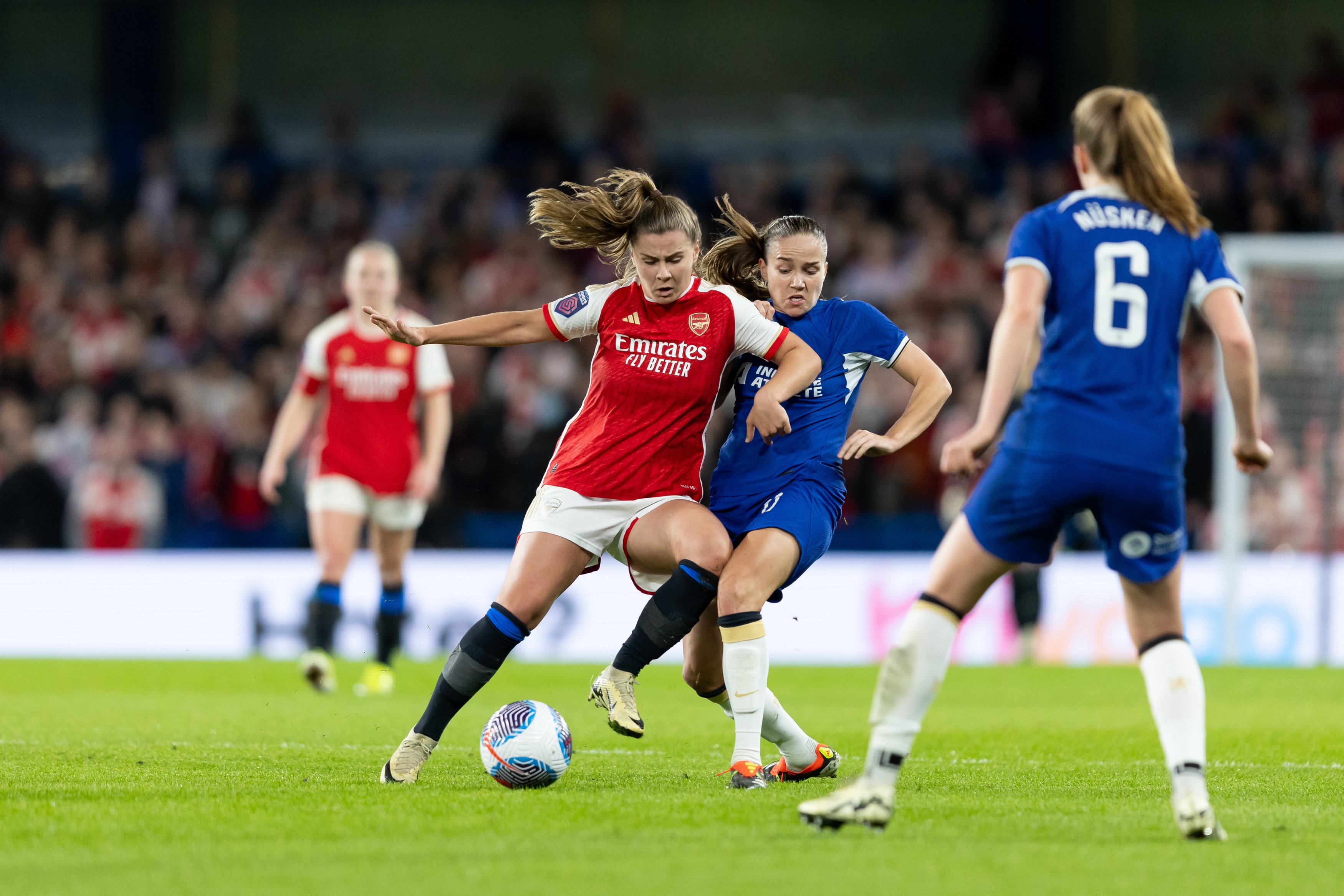Victoria Pelova of Arsenal Women and Guro Reiten of Chelsea compete for the ball