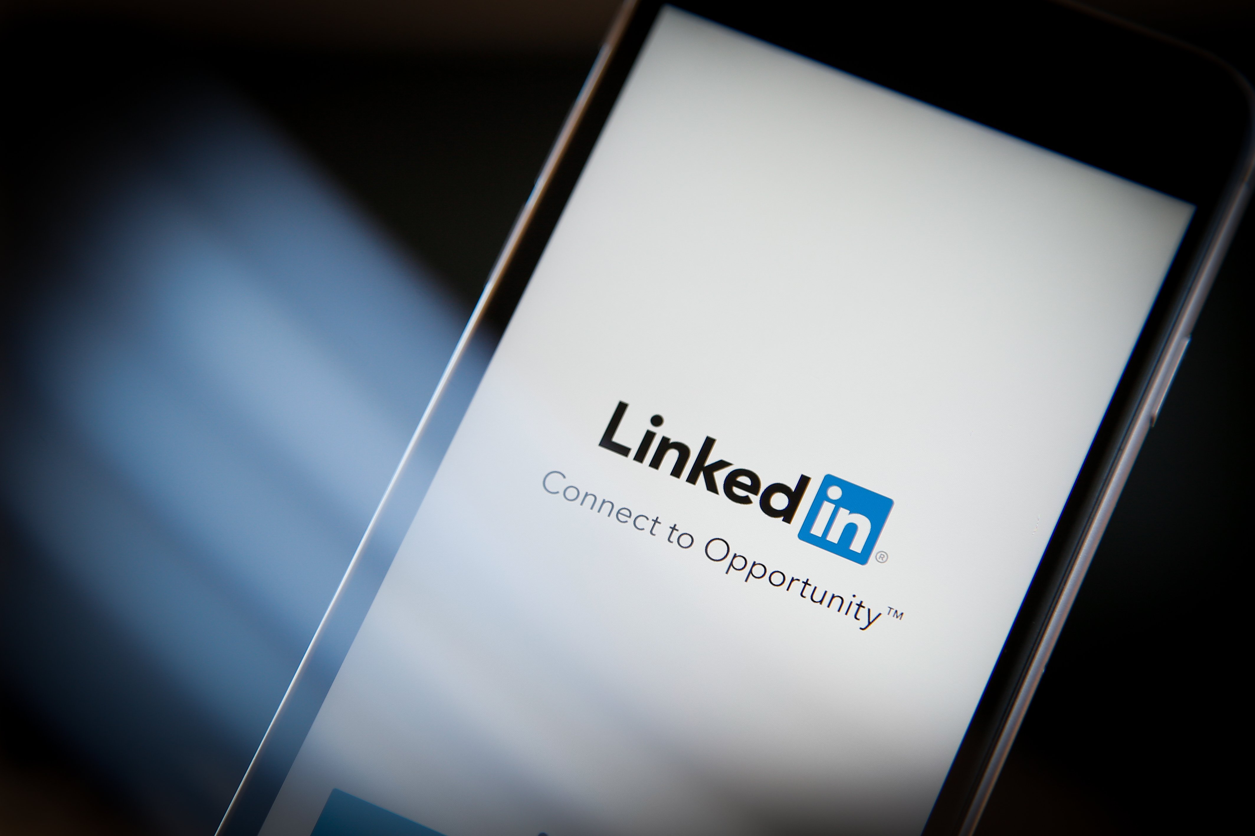 The LinkedIn app and logo is seen on a digital device.