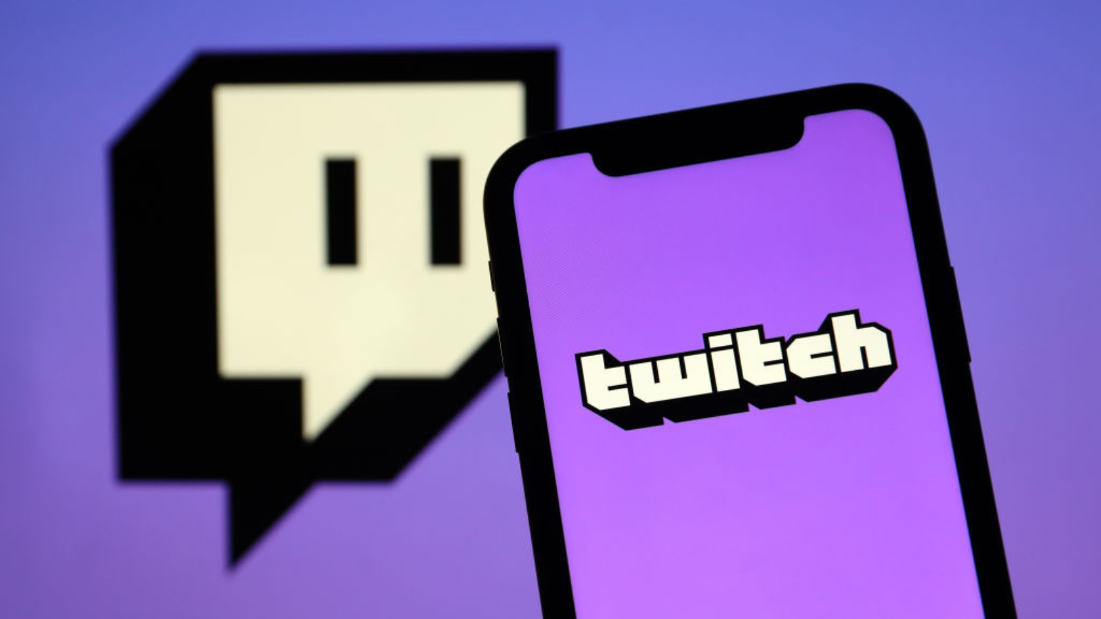 The Twitch logo displayed on a smartphone.