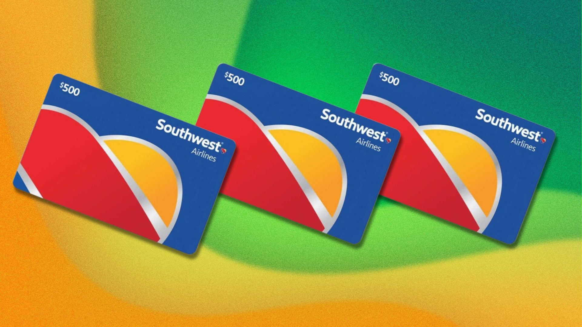 three southwest airlines gift cards appear in a line on a diagonal. the background is wavy yellow and green