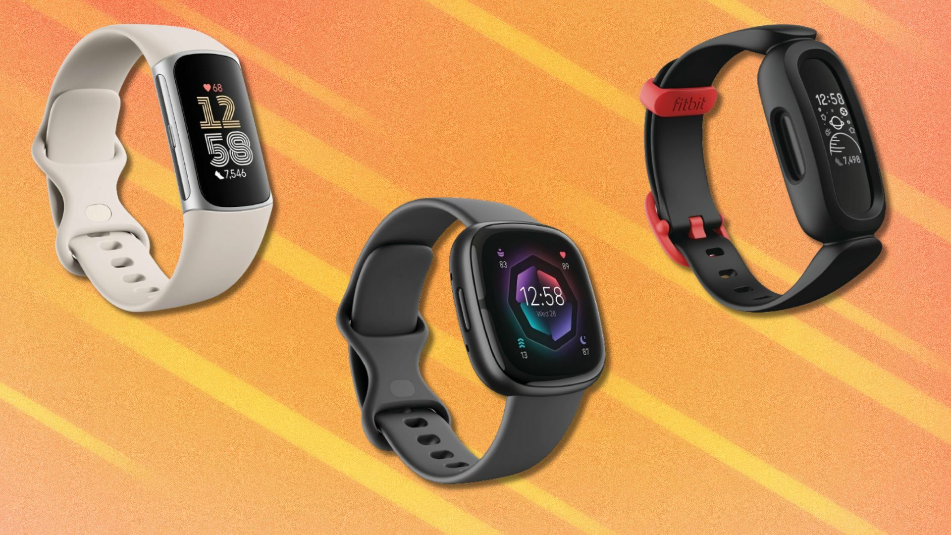 three fitbit fitness trackers sit on an orange background with white streaks